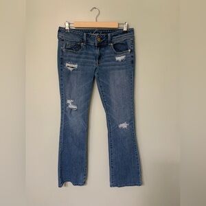 American Eagle — women’s original boot cut distressed denim blue jeans